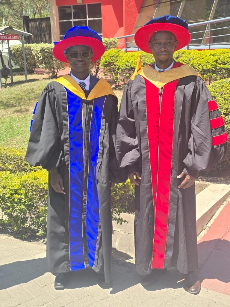Dr. Jeff Owino in doctoral graduation regalia at commencement